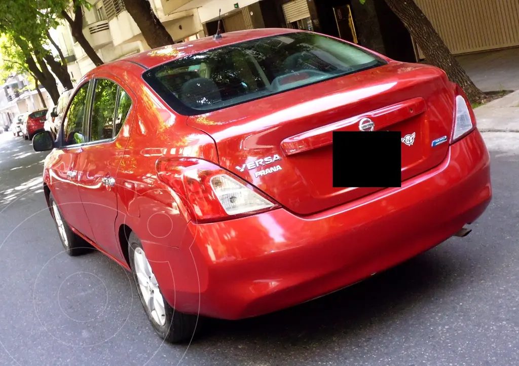 foto Nissan Versa Acenta usado (2014) color Rojo precio u$s9.500