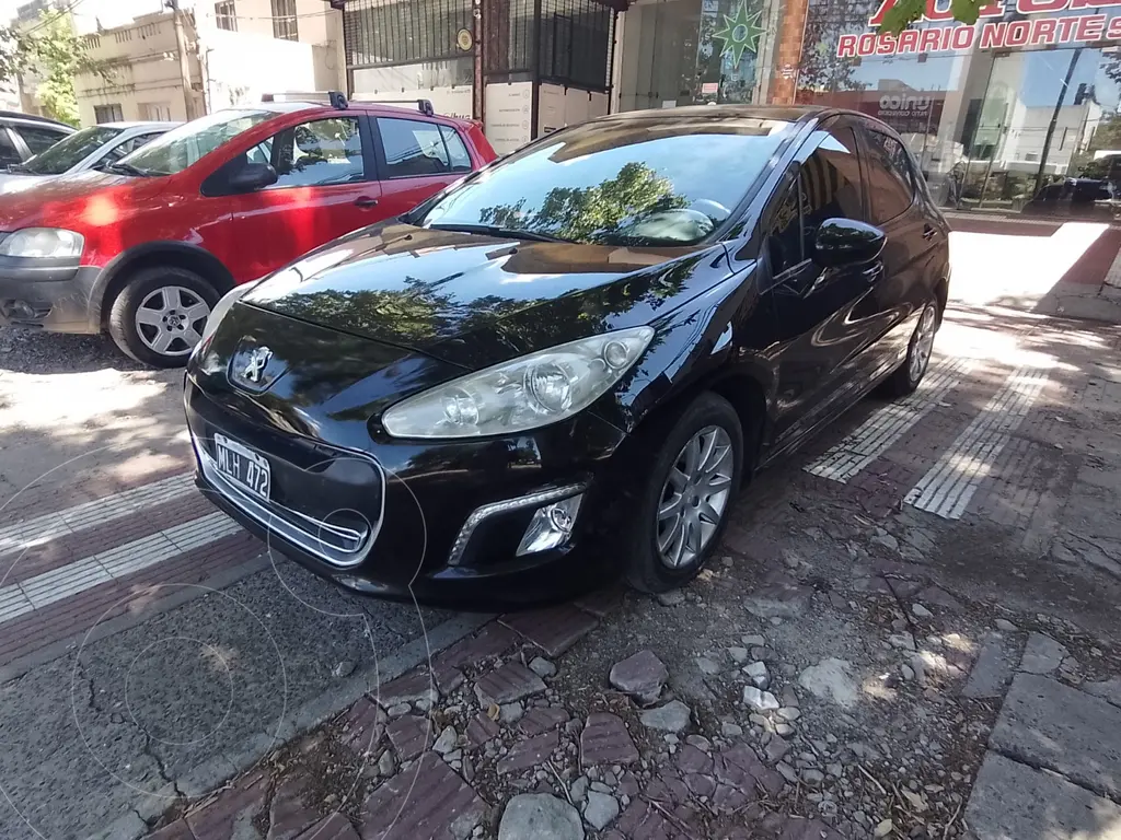 foto Peugeot 308 Allure NAV usado (2013) color Negro precio $3.500.000