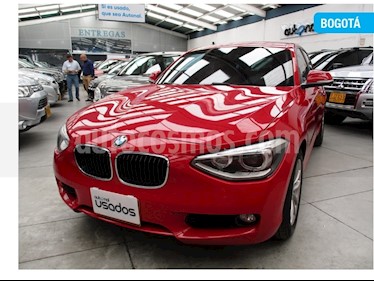 foto BMW Serie 1 116i 5P Aut usado (2014) color Rojo precio $59.400.000
