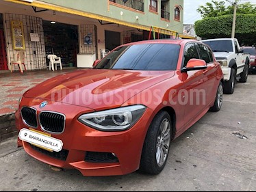 foto BMW Serie 1 118i Sport 5P usado (2015) color Naranja precio $49.999.999