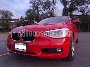 foto BMW Serie 1 5P 118iA Sport Line usado (2014) color Rojo Crimson precio $215,000