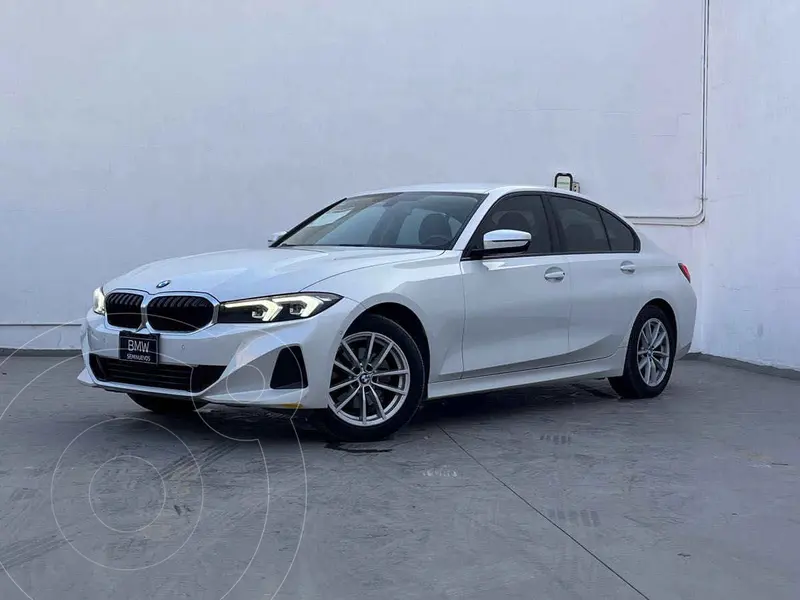 Foto BMW Serie 3 320i Aut usado (2023) color Blanco financiado en mensualidades(enganche $138,380 mensualidades desde $13,651)