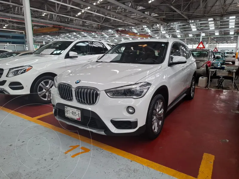 Foto BMW X1 sDrive 20iA X Line usado (2019) color Blanco Mineral financiado en mensualidades(enganche $99,800 mensualidades desde $9,000)