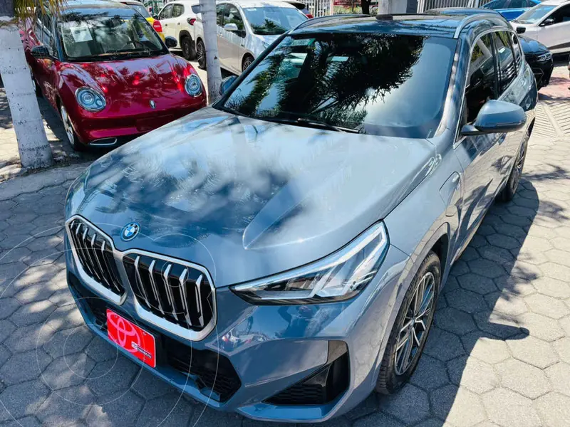 Foto BMW X1 xDrive25e usado (2024) color Gris financiado en mensualidades(enganche $187,319 mensualidades desde $16,638)
