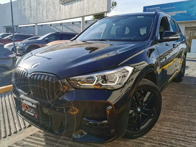 Foto BMW X1 sDrive 20iA M Sport usado (2020) color Negro financiado en mensualidades(enganche $133,525 mensualidades desde $10,211)