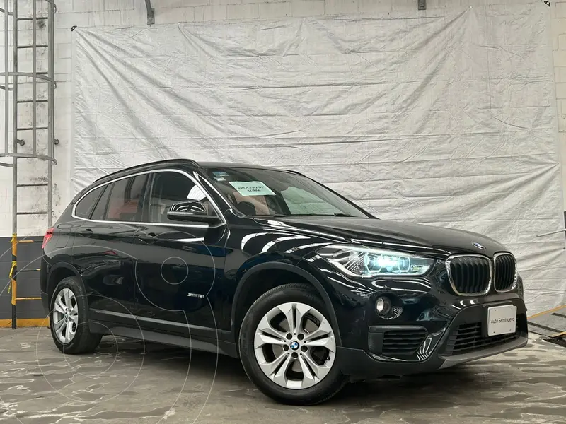 Foto BMW X1 sDrive 18iA usado (2018) color Negro precio $310,000