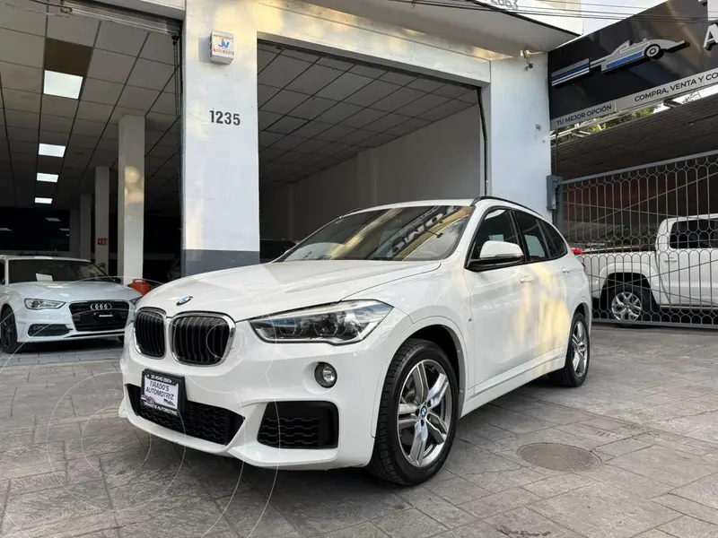 Foto BMW X1 sDrive 20iA M Sport usado (2019) color Blanco financiado en mensualidades(enganche $74,000 mensualidades desde $11,168)