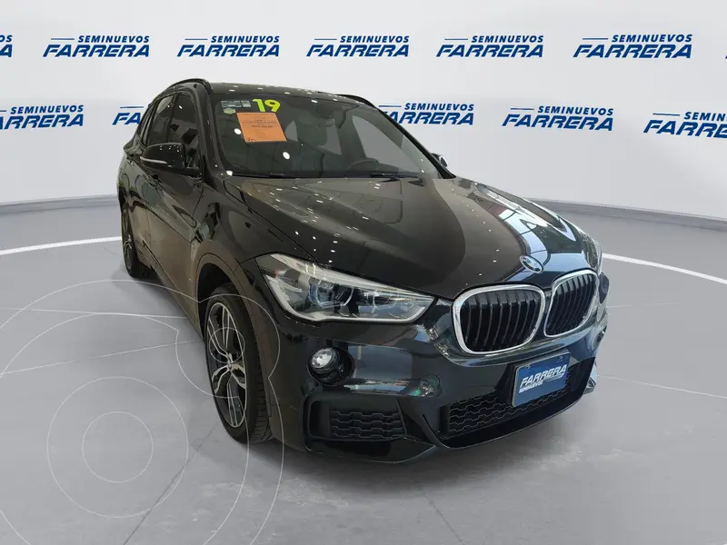 Foto BMW X1 sDrive 20iA M Sport usado (2019) color Negro financiado en mensualidades(enganche $124,750 mensualidades desde $12,652)