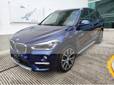 Foto venta Auto usado BMW X1 sDrive 20iA X Line (2019) color Azul Medianoche precio $498,501