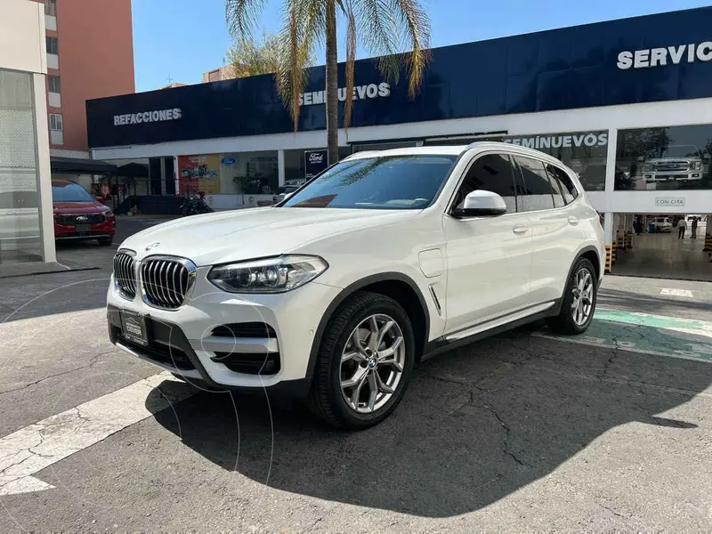 Foto BMW X3 xDrive30e usado (2021) color Blanco financiado en mensualidades(enganche $221,719 mensualidades desde $23,594)