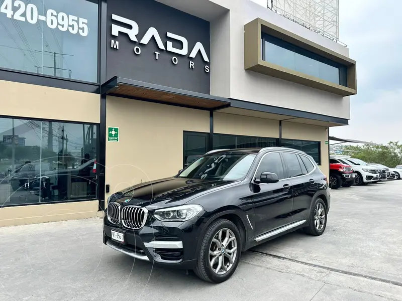 Foto BMW X3 xDrive30e usado (2021) color Negro precio $759,800