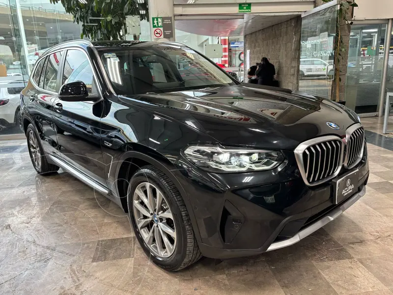 Foto BMW X3 xDrive30e usado (2022) color Negro precio $899,000