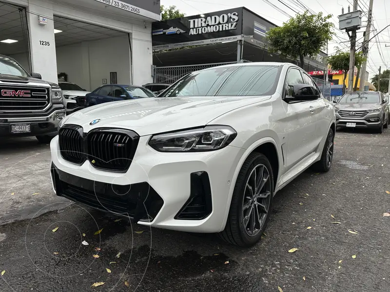 Foto BMW X4 M40i usado (2023) color Blanco financiado en mensualidades(enganche $260,000 mensualidades desde $35,083)