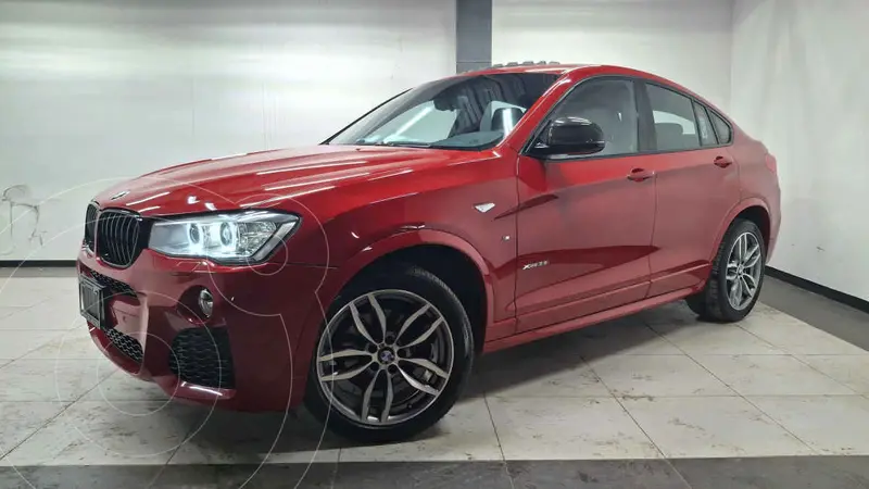 Foto BMW X4 xDrive35i M Sport Aut usado (2017) color Rojo financiado en mensualidades(enganche $90,200 mensualidades desde $8,898)