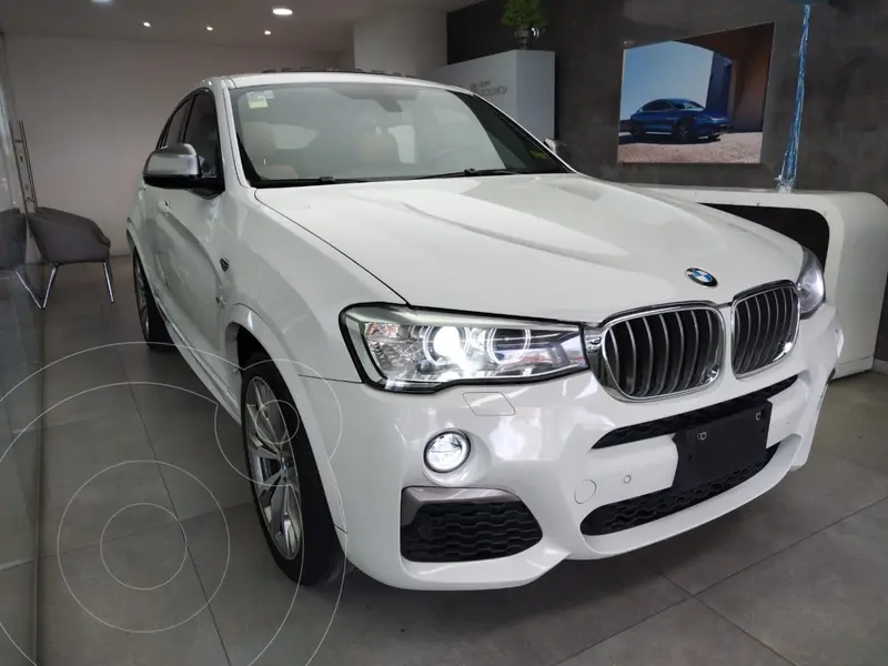 Foto BMW X4 M40iA Aut usado (2018) color Blanco financiado en mensualidades(enganche $140,000 mensualidades desde $95,000)