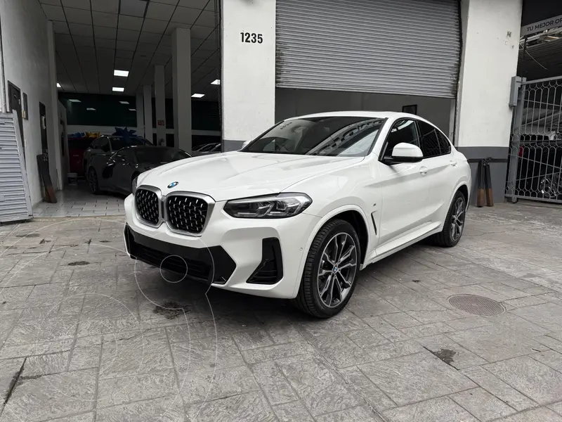 Foto BMW X4 xDrive30i usado (2025) color Blanco financiado en mensualidades(enganche $260,000 mensualidades desde $35,228)