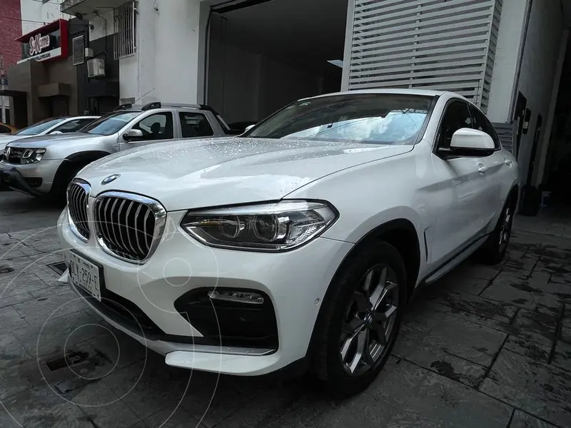 Foto BMW X4 xDrive30iA X Line Aut usado (2019) color Blanco financiado en mensualidades(enganche $145,000 mensualidades desde $20,953)