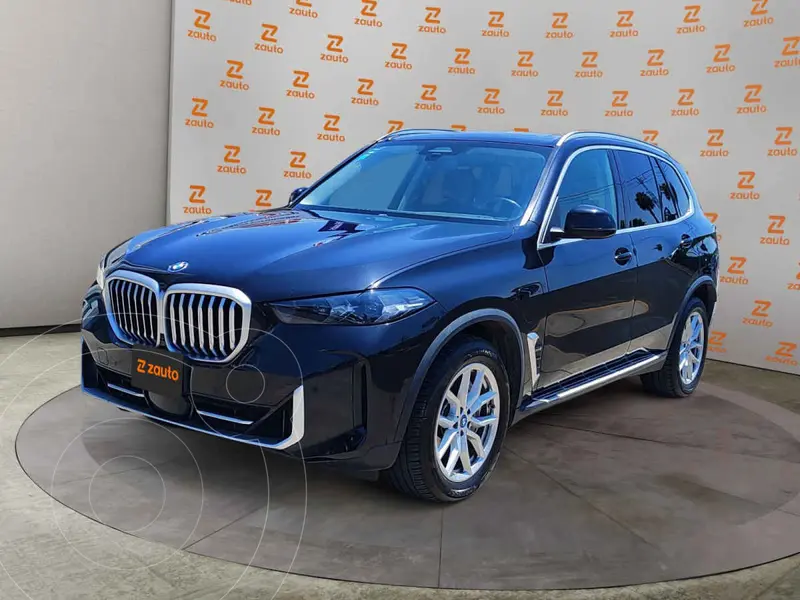 Foto BMW X5 xDrive45e usado (2024) color Negro financiado en mensualidades(enganche $327,000 mensualidades desde $25,016)