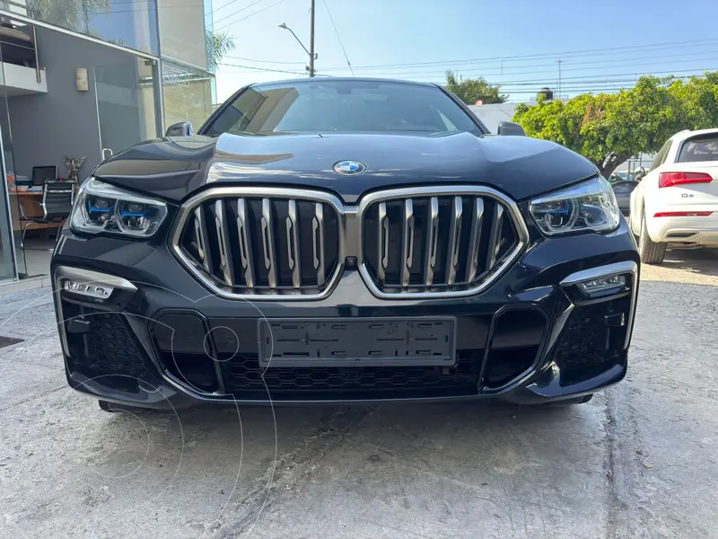 Foto BMW X6 M50i usado (2021) color Negro precio $1,350,000