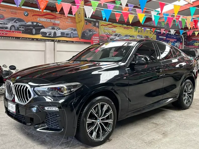 Foto BMW X6 xDrive40i M Sport usado (2021) color Negro financiado en mensualidades(enganche $327,017 mensualidades desde $35,652)