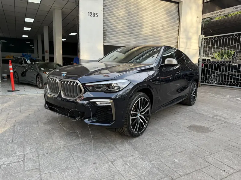 Foto BMW X6 M50i usado (2022) color Azul financiado en mensualidades(enganche $260,000 mensualidades desde $38,996)