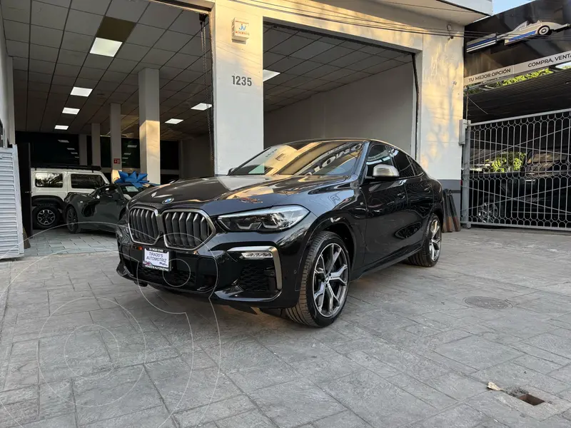 Foto BMW X6 M50iA usado (2021) color Negro financiado en mensualidades(enganche $260,000 mensualidades desde $36,885)