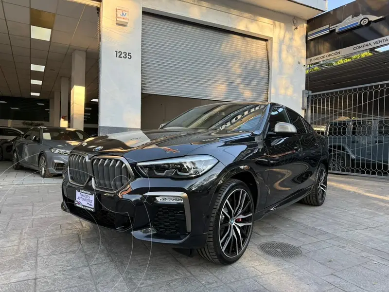 Foto BMW X6 M50i usado (2021) color Negro precio $1,159,000