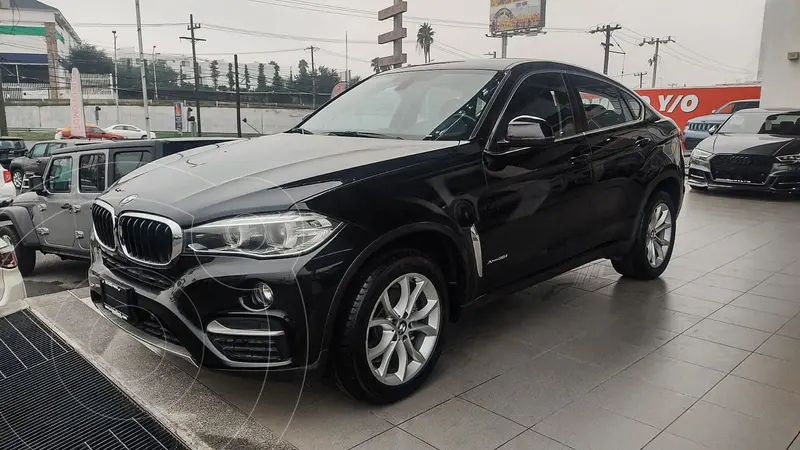 Foto BMW X6 xDrive 35iA usado (2019) color Negro financiado en mensualidades(enganche $129,580 mensualidades desde $13,260)