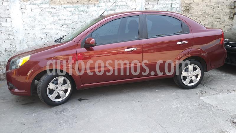 Chevrolet Aveo Paq B usado (2013) color Rojo precio $80,000