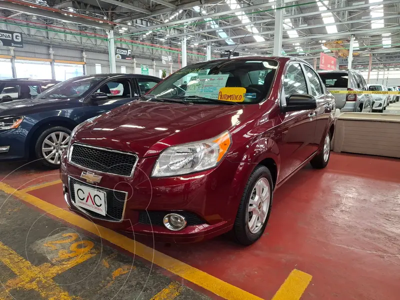 Foto Chevrolet Aveo LT usado (2013) color Rojo Tinto financiado en mensualidades(enganche $38,000 mensualidades desde $4,500)