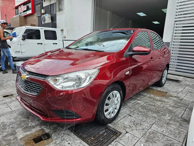 Foto Chevrolet Aveo LS Aut usado (2022) color Rojo Cerezo financiado en mensualidades(enganche $44,000 mensualidades desde $7,115)