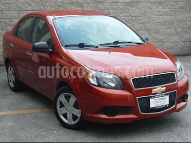 Foto Chevrolet Aveo 4P LS TM5 A/AC. R-14 usado (2016) color Naranja precio $140,000