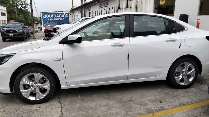 Foto Chevrolet Onix Premier Aut usado (2021) color Blanco financiado en mensualidades(enganche $57,120 mensualidades desde $6,511)