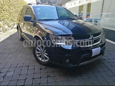 foto Dodge Journey 5P SXT LUJO 2.4L TA 7 PAS. PIEL VE BL DVD RA-17 usado (2016) color Negro precio $275,000