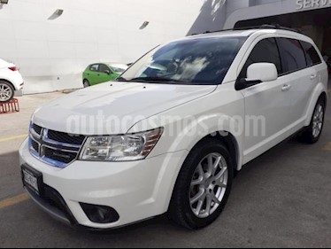 foto Dodge Journey 5P SXT PREMIUM 3.6L TA 7 PAS. BL DVD RA-19 usado (2012) color Amarillo precio $189,000