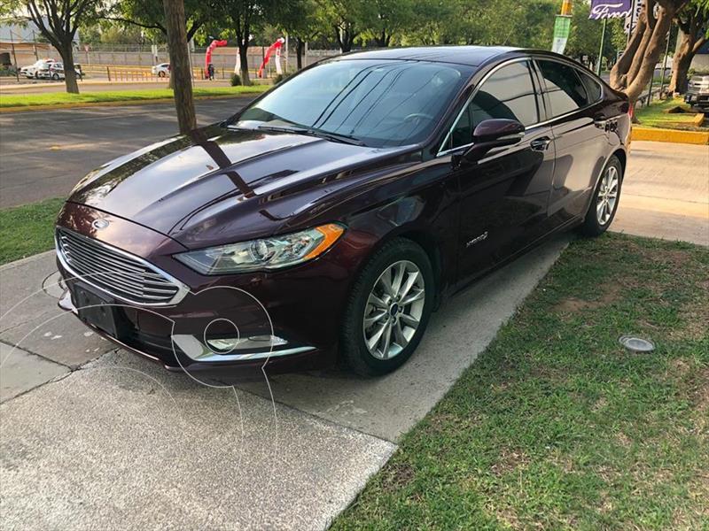 Foto Ford Fusion SE LUX Hibrido usado (2017) color Rojo precio $335,000