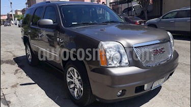 Foto GMC Yukon Denali 8 Vel AWD usado (2012) color Champagne precio $255,000