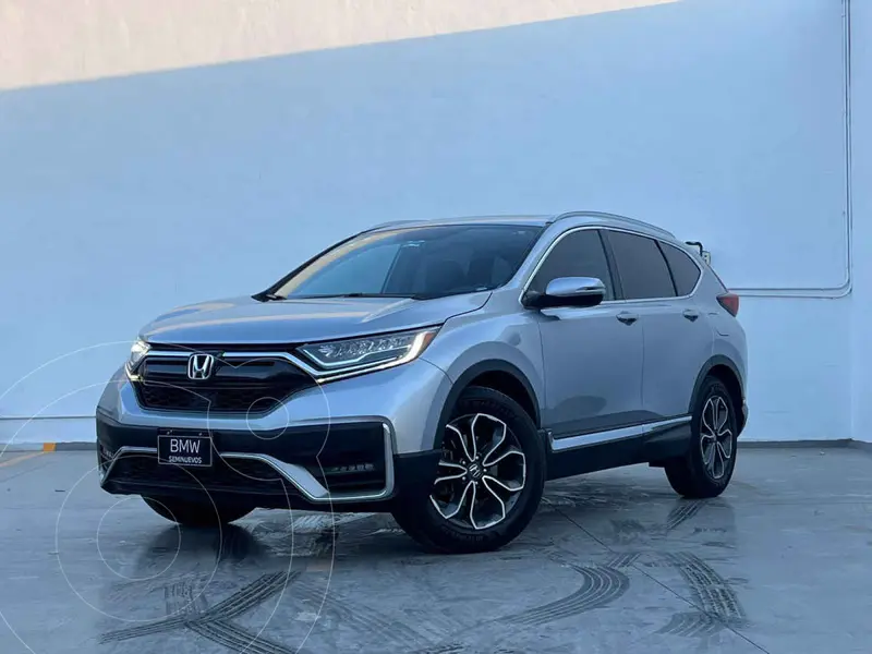 Foto Honda CR-V Touring usado (2021) color Gris financiado en mensualidades(enganche $105,380 mensualidades desde $10,396)
