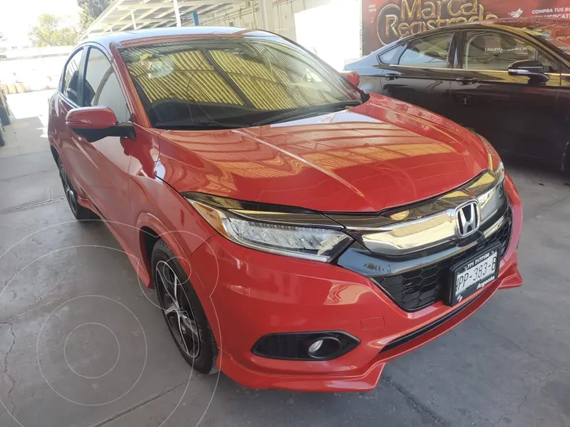Foto Honda HR-V Touring usado (2021) color Rojo financiado en mensualidades(enganche $120,000 mensualidades desde $11,876)