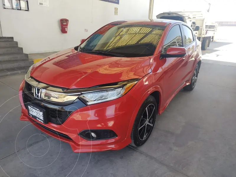 Foto Honda HR-V Touring usado (2021) color Rojo financiado en mensualidades(enganche $120,000 mensualidades desde $11,876)