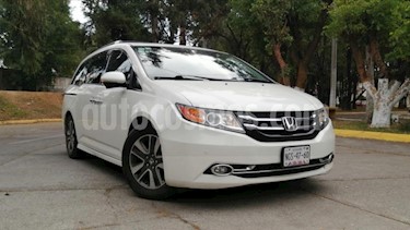 Honda Odyssey 5P TOURING TA A/AC. AUT. QC PIEL CD DVD F. HALOGE usado (2014) color Blanco precio $305,000