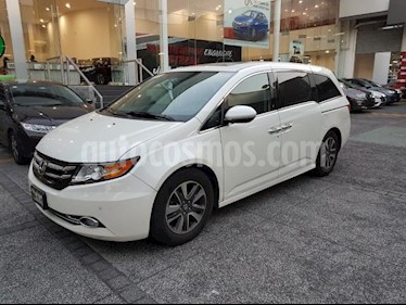 Honda Odyssey 5P TOURING TA A/AC. AUT. QC PIEL CD DVD F. HALOGE usado (2015) color Blanco precio $414,000