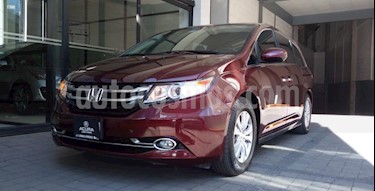 foto Honda Odyssey 5P EXL TA A/AC. AUT. CD DVD F. HALOGENO RA-17 usado (2016) color Rojo precio $413,000