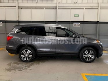 foto Honda Pilot 5P TOURING TA A/AC. AUT. QCP PIEL MP3 DVD 4X4 usado (2015) color Gris precio $369,000