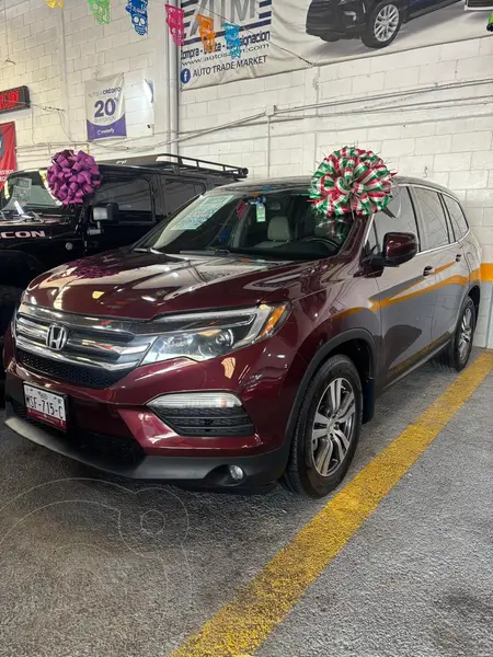 Foto Honda Pilot Touring usado (2016) color Rojo Cobrizo precio $317,000