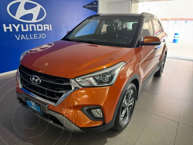 Foto Hyundai Creta 165570 usado (2019) color Naranja financiado en mensualidades(enganche $71,219 mensualidades desde $6,199)