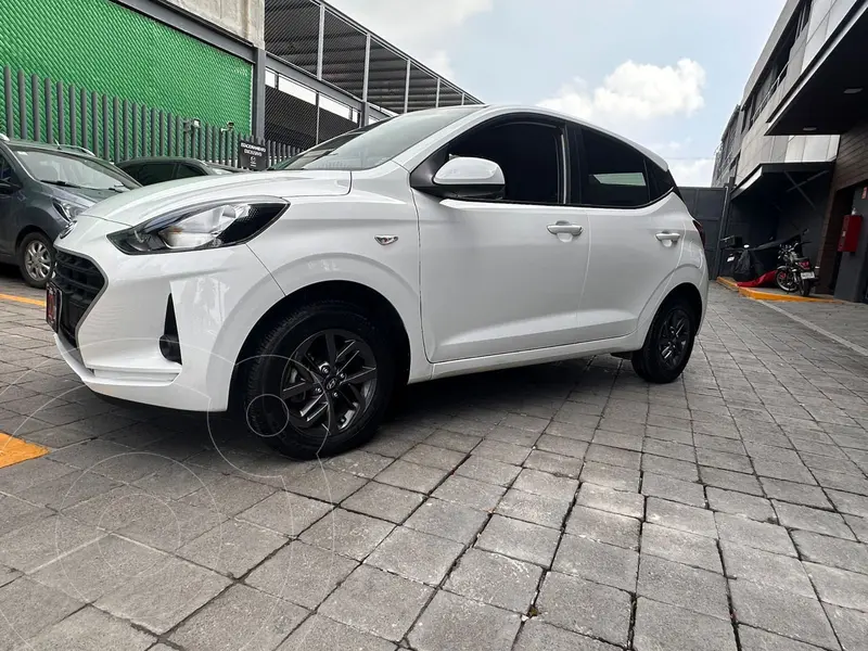 Foto Hyundai Grand i10 MID usado (2022) color Blanco financiado en mensualidades(enganche $68,125 mensualidades desde $5,209)