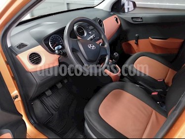 foto Hyundai Grand i10 5P GL MID L4/1.2 PREMIUM MAN usado (2015) color Naranja precio $125,000