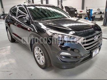 Hyundai Tucson 5P GLS PREMIUM TA A/AC. F. NIEBLA RA-17 usado (2017) color Negro precio $300,000