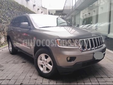 foto Jeep Grand Cherokee 5P LAREDO LUJO V6 3.6L TA PIEL MP3 RA-17 usado (2013) color Gris precio $250,000